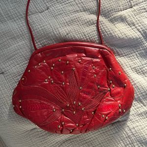 Vintage red leather crossbody clutch